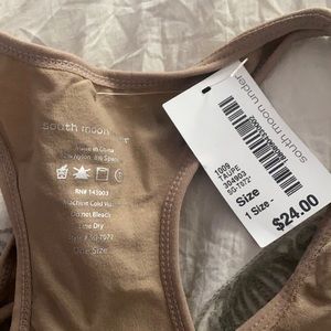 Never worn, tags still on brown stretchy bodysuit
